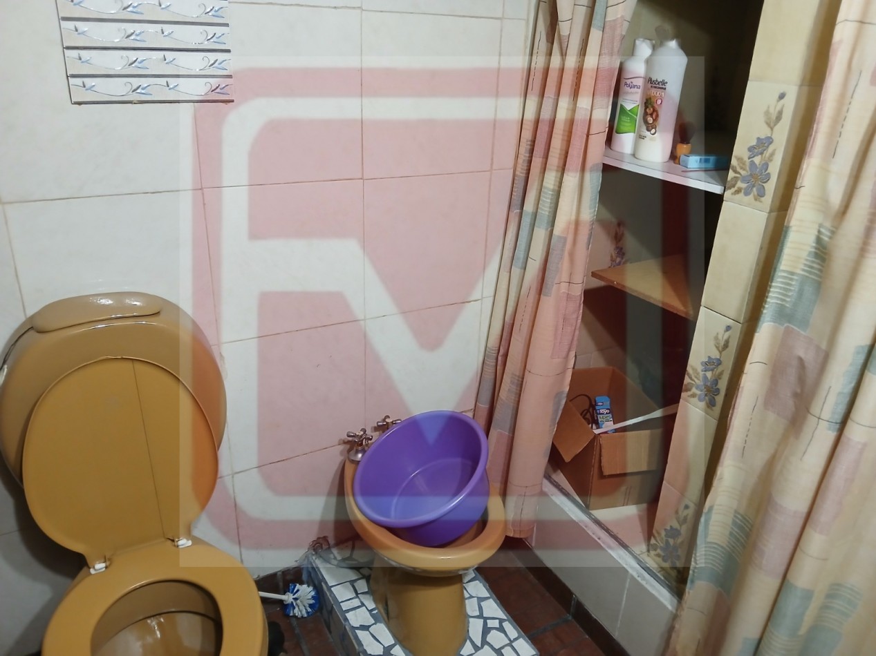 Vivienda multifamiliar en dos plantas. Caupolican 5542. Isidro Casanova. 